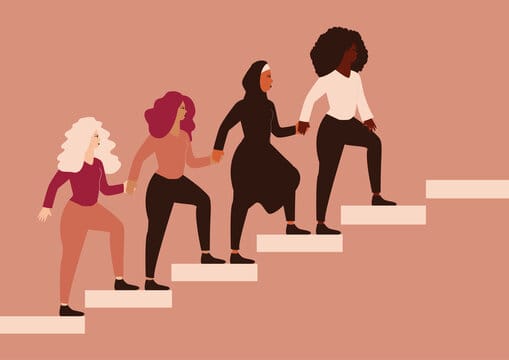 Women holding hands supporting each other